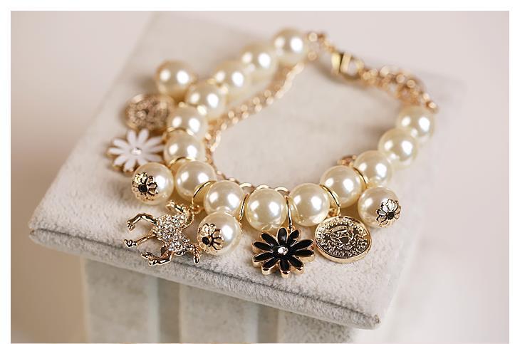 Perlenblumenarmband für Damen