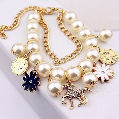 Perlenblumenarmband für Damen