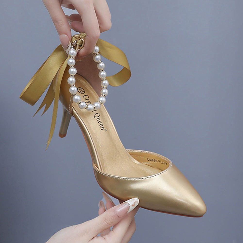 Sandalen mit mittelhohem Absatz und Strass-Schleife